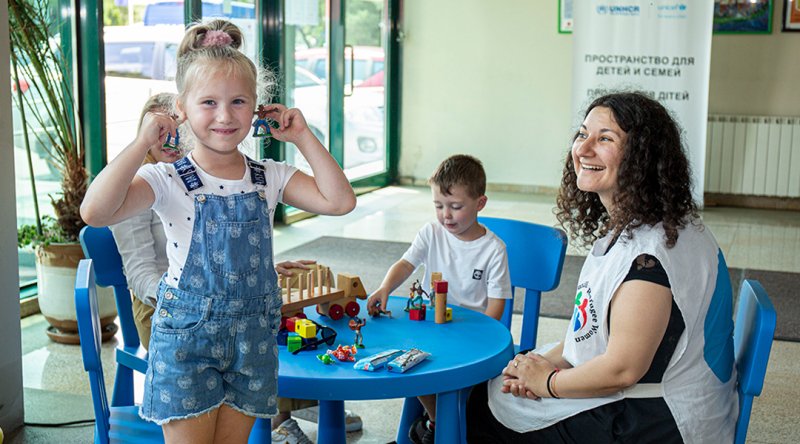 On 13 June 2022, children play at a UNICEF-UNHCR Blue Dot Safe Space, Protection and Support Hub in Sofia, Bulgaria. Blue Dots provide support and services to children and their families who have fled the war in Ukraine. © UNICEF/UN0658129/Milkova